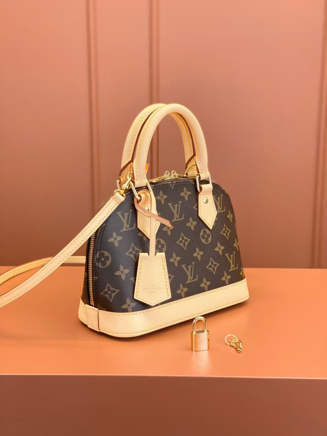 Alma BB Monogram Canvas Brown Top Handle Bag