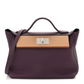 Togo Swift 24/24 29 Cassis Chai Cuivre